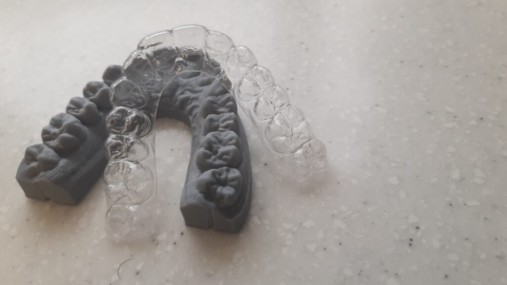 Clear aligners for straightening teeth